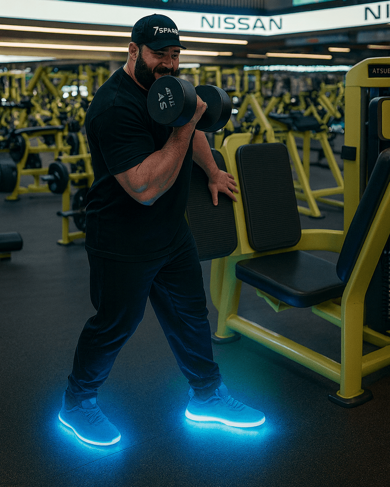 Person lifting weights in a gym He wears comfortable Softy Steps shoe insoles.