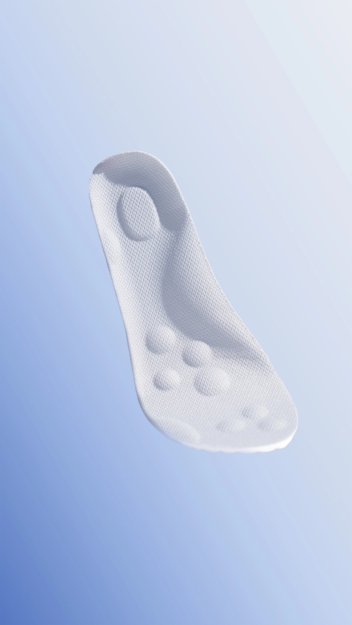 Gray shoe sole with texture on a light blue background